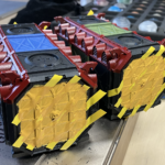 Two Munitorum Containers masked off and painted