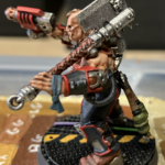 A Goliath ganger that had a power hammer replaced by a cleaver.