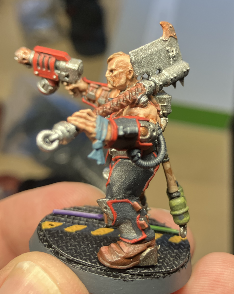 a Goliath miniature primed With Green Stuff World Paint